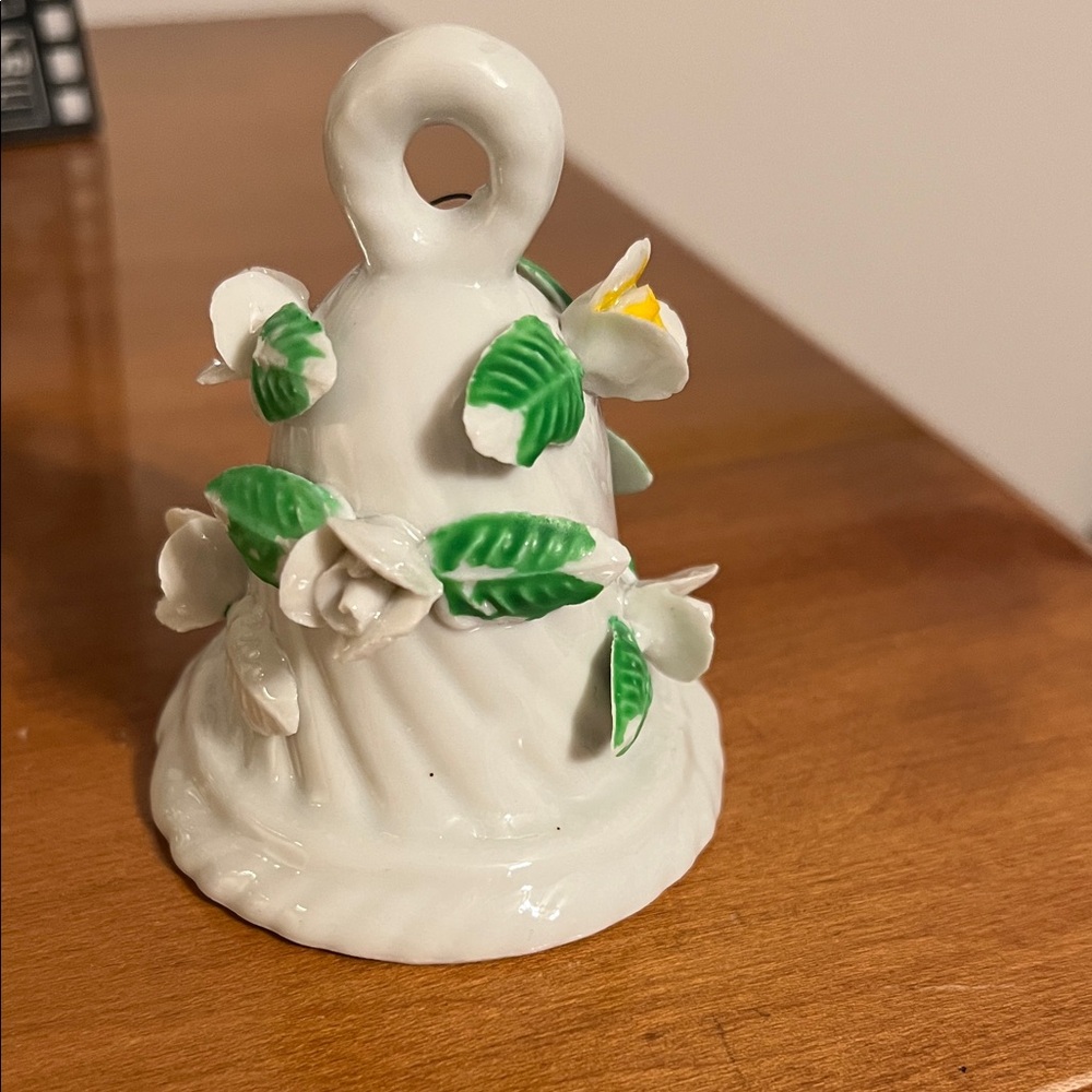 Vintage porcelain Floral Bell with raised roses and leaves.